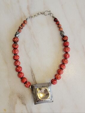 Handcrafted Red Bead Necklace with Silver Pendant